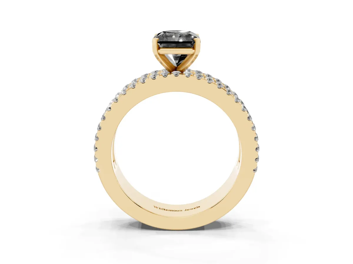 Fancy Black Radiant Cut Diamond Solitaire Ring with Pavé and Channel Set Band Yellow gold