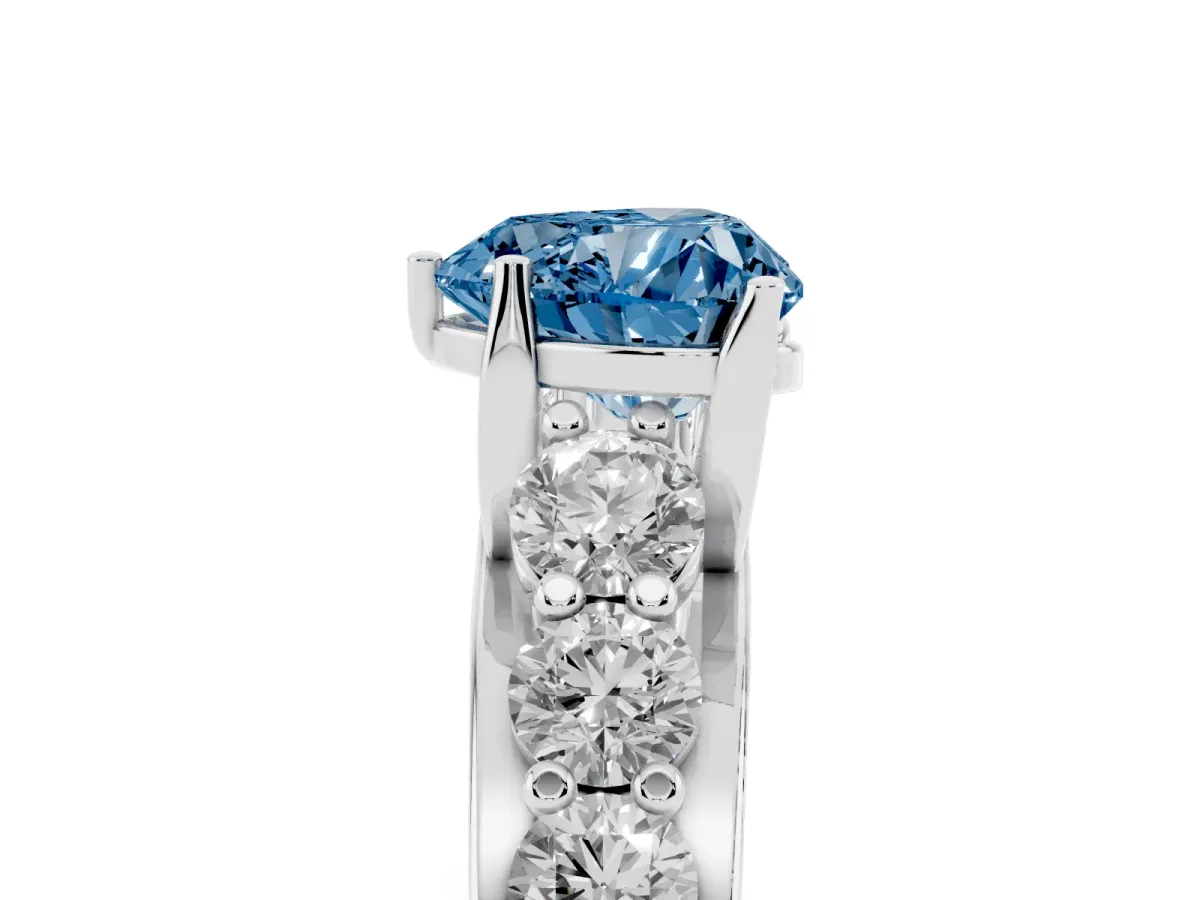 Fancy Blue Heart Cut Diamond Engagement Ring with Pavé Band and Four-Prong Setting Platinum