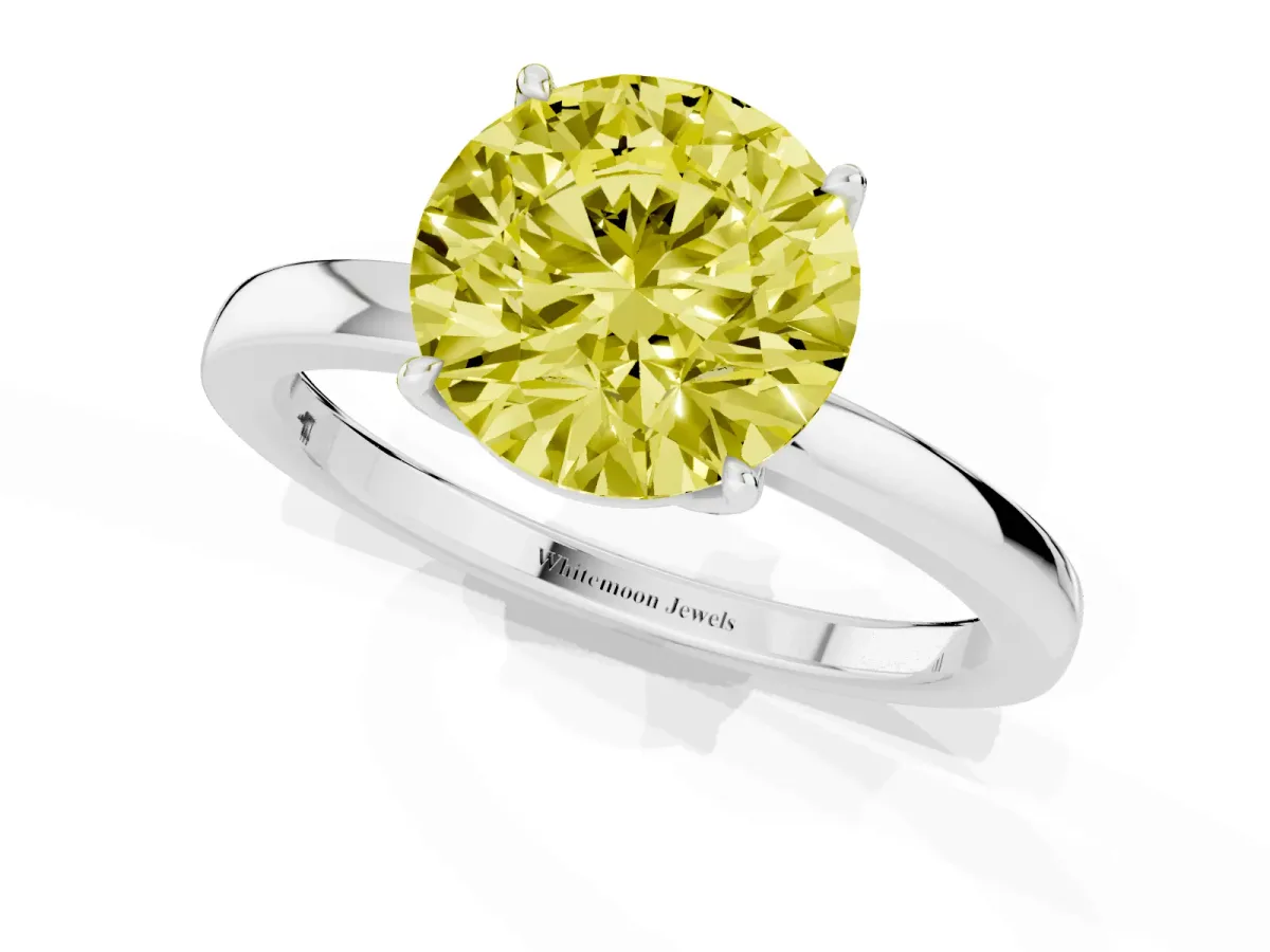 Fancy Yellow Round Cut Diamond Solitaire Ring with Thin Band and Prong Setting Silver