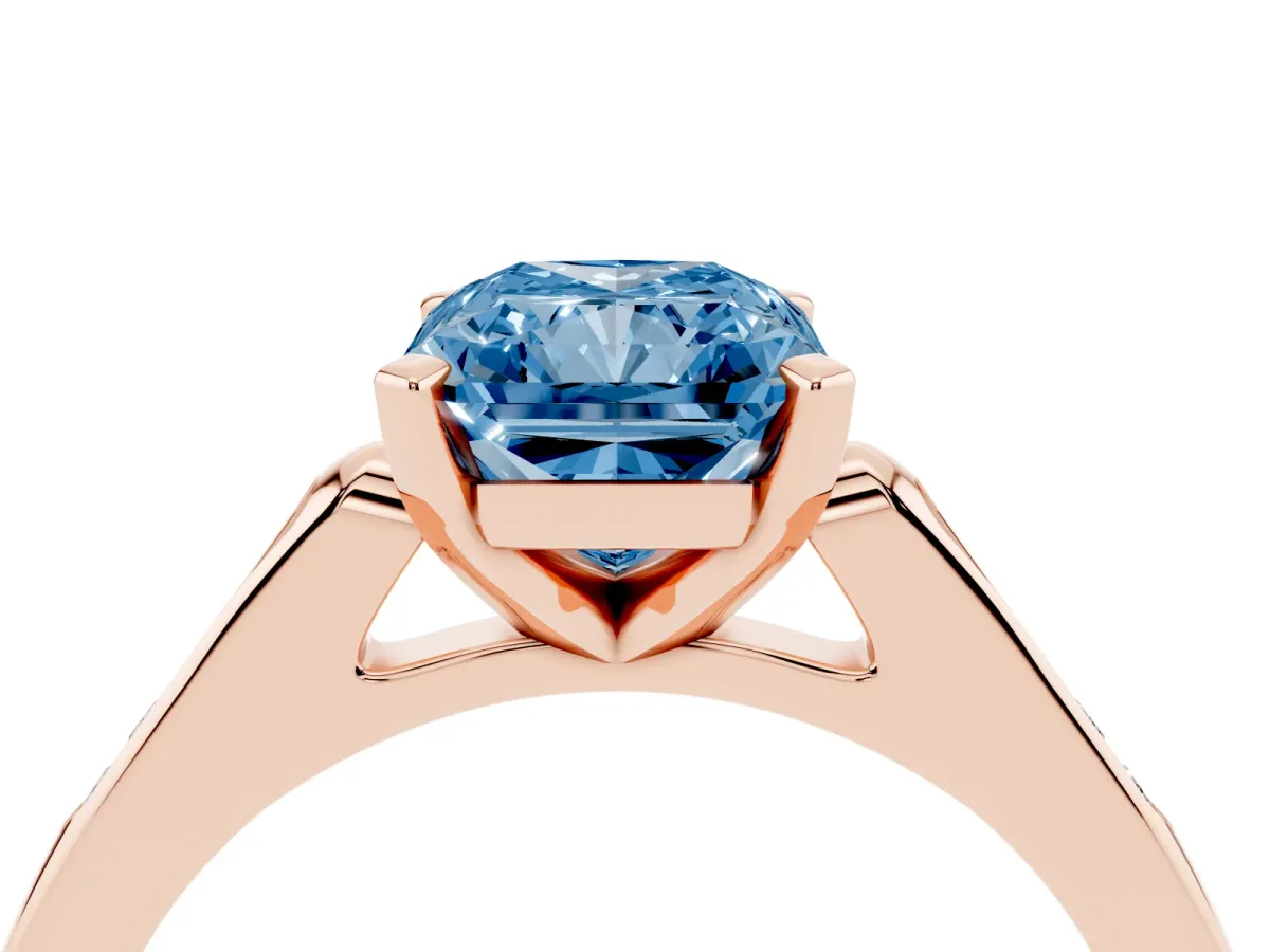 Fancy Blue Radiant Cut Diamond Solitaire Ring with Channel Set Round Band and Prong Setting Rose gold