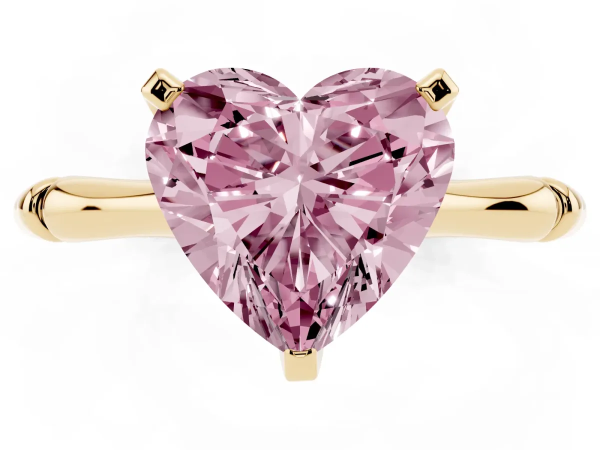 Fancy Pink Heart Cut Solitaire Diamond Ring with Bamboo Band and Four-Prong Setting Yellow gold