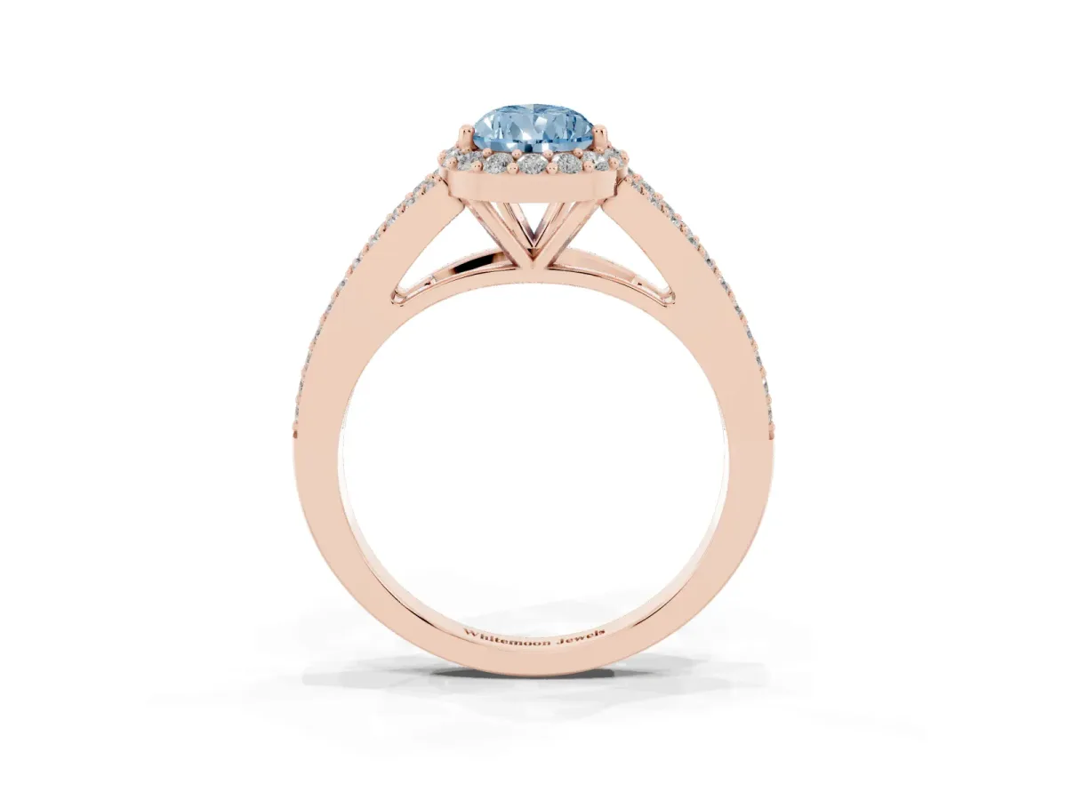Fancy Blue Pear Cut Halo Split Shank Pave Diamond Ring with Four-Prong Setting Rose gold