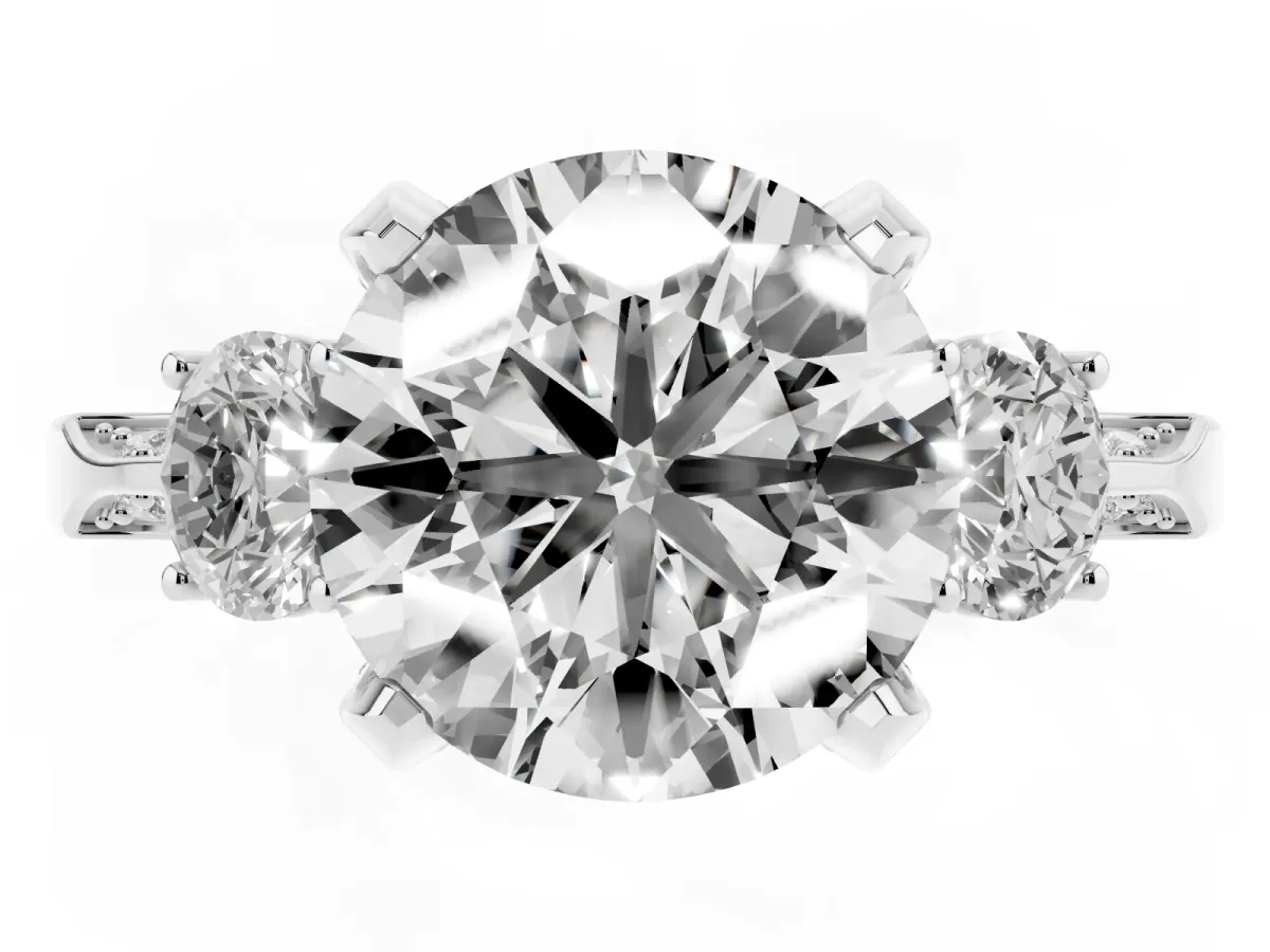 Round Cut Brilliant Three-Stone Diamond Ring with Pavé Band and Four-Prong Setting Silver
