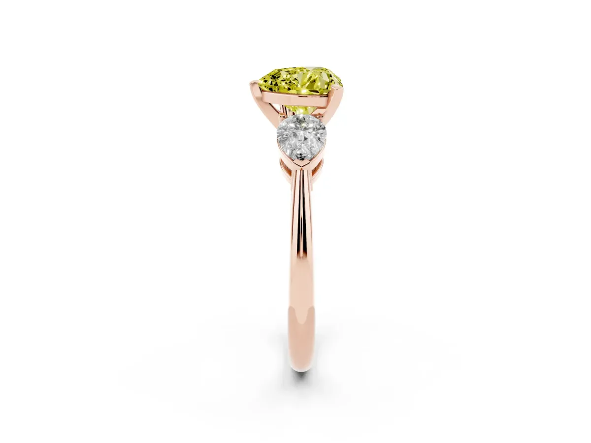Fancy Yellow Three-Stone Heart Cut Diamond Ring with Pear Side Stones and Four-Prong Setting Rose gold