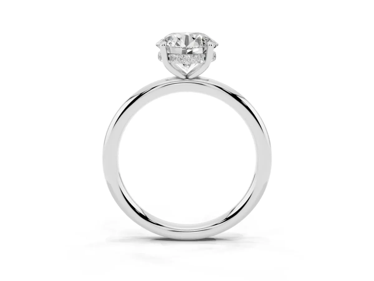 Round Cut Diamond Solitaire Ring with Thin Band and Four-Prong Setting Silver