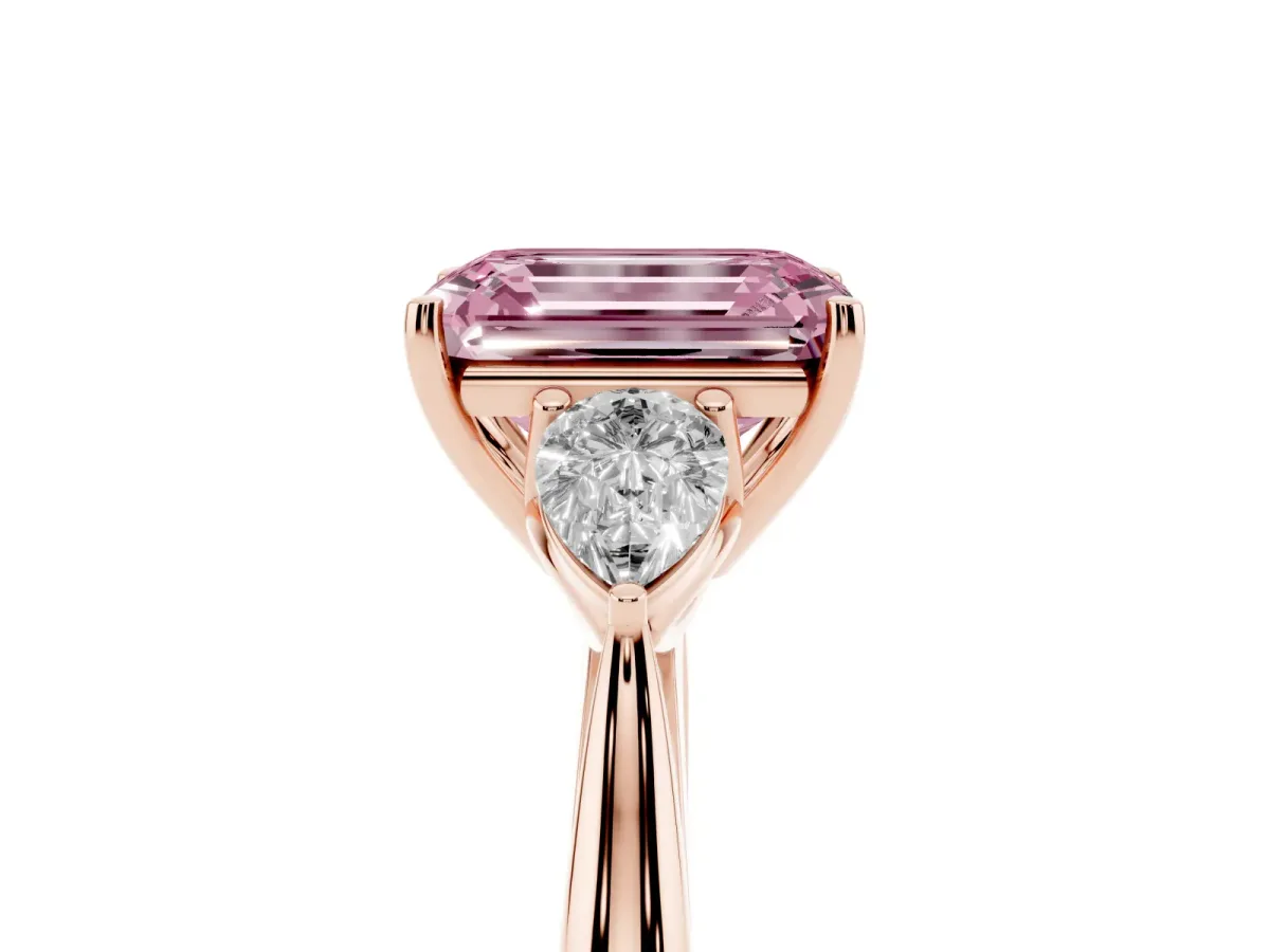 Fancy Pink Three-Stone Emerald Cut Brilliant Diamond Solitaire Ring with Tapered Band and Four-Prong Setting Rose gold