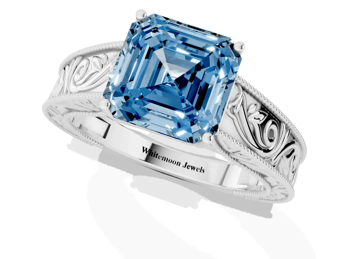 Fancy Blue Asscher Cut Diamond Solitaire Ring with Engraved Band and Four-Prong Setting White gold