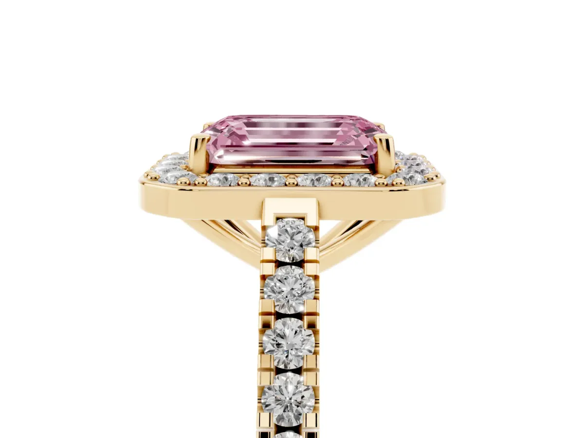 Fancy Pink Emerald Cut Diamond Halo Ring with Round Pavé Split Shank and Prong Setting Yellow gold