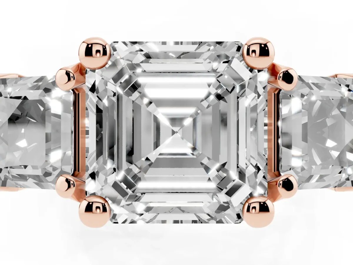 Asscher Cut Diamond Three-Stone Ring with Channel Set Band and Four-Prong Setting Rose gold