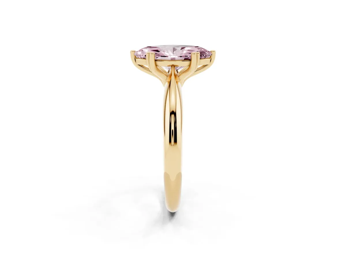 Fancy Pink Marquise Cut Cut Solitaire Engagement Ring with Tapered Band and Four-Prong Setting Yellow gold
