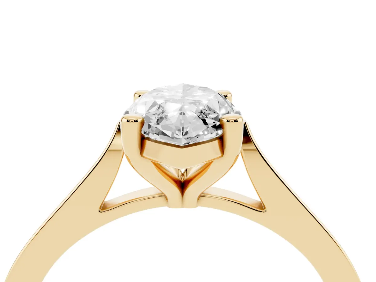 Marquise Cut Solitaire Diamond Ring with Four-Prong Setting and Tapered Band Yellow gold