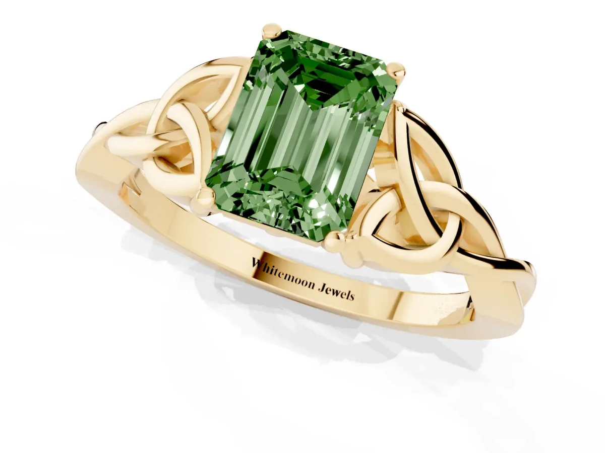 Fancy Green Emerald Cut Diamond Solitaire Engagement Ring with Celtic Knot Band and Four-Prong Setting Yellow gold