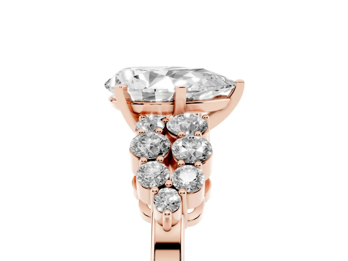 Pear Cut Cluster Diamond Engagement Ring with Pavé Band and Four-Prong Setting Rose gold