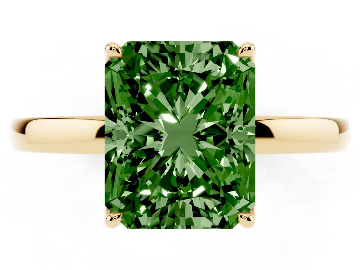 Fancy Green Radiant Cut Diamond Solitaire Ring with Thin Band and Prong Setting Yellow gold