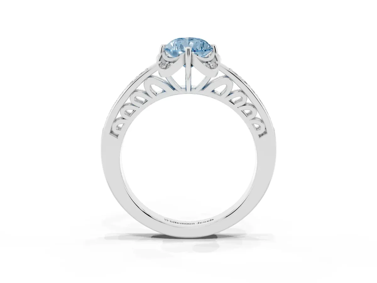 Fancy Blue Pear Cut Cut Halo Diamond Ring with Channel Set Band and Four-Prong Setting Silver