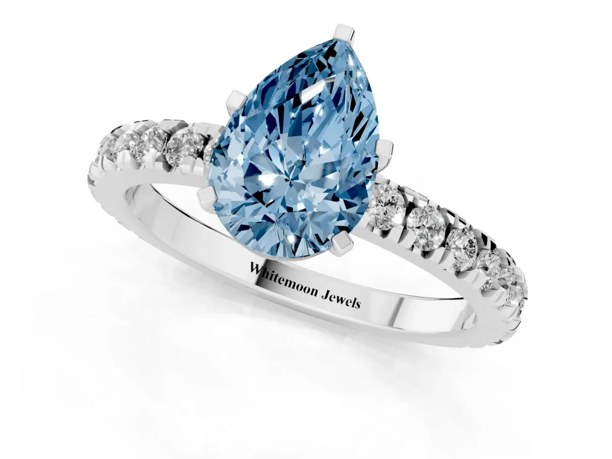 Fancy Blue Pear Cut Diamond Pavé Band Solitaire with Four-Prong Setting Silver