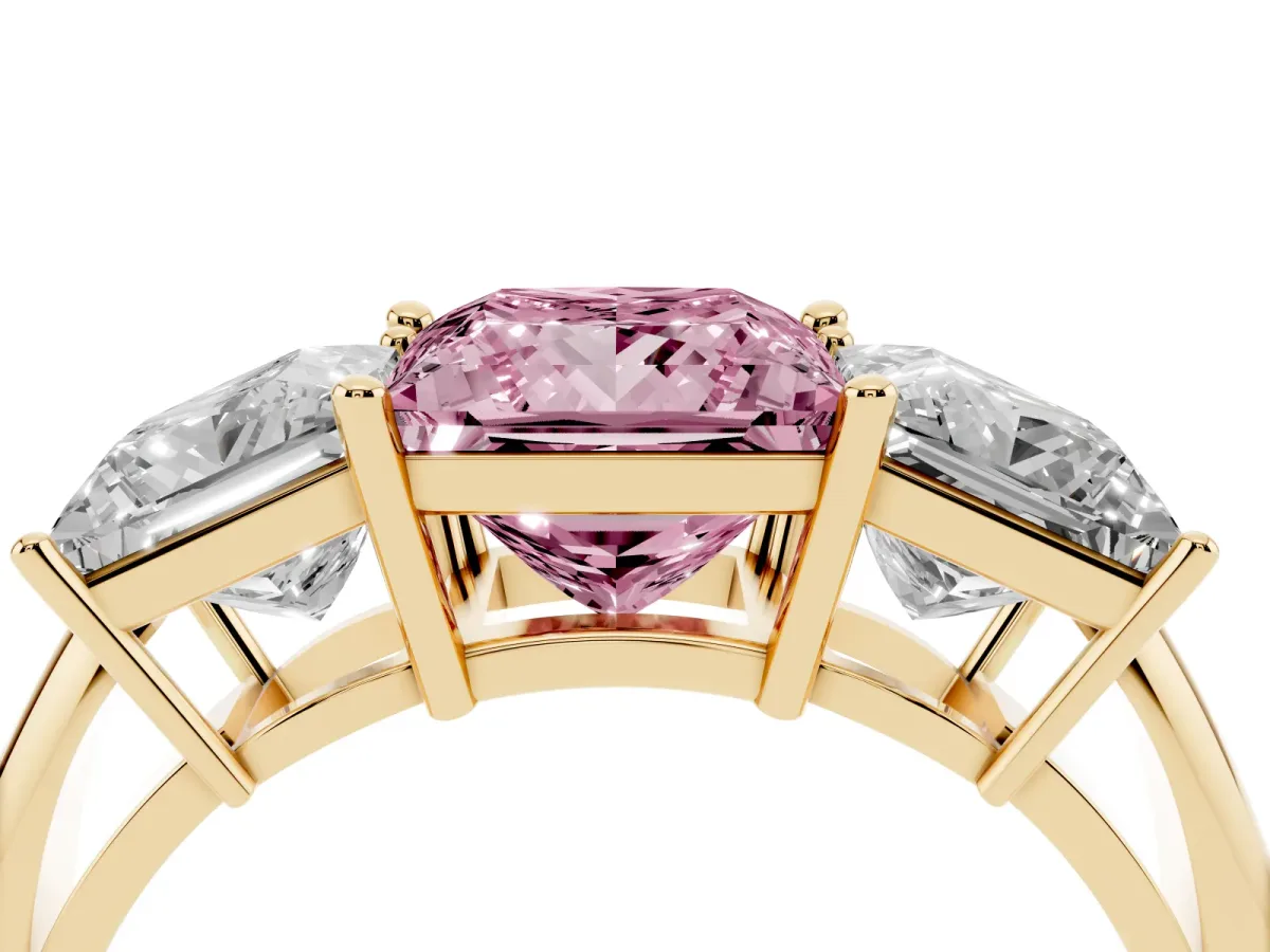 Fancy Pink Three-Stone Princess Cut Cut Diamond Engagement Ring with Prong Setting on a White Gold Band Yellow gold