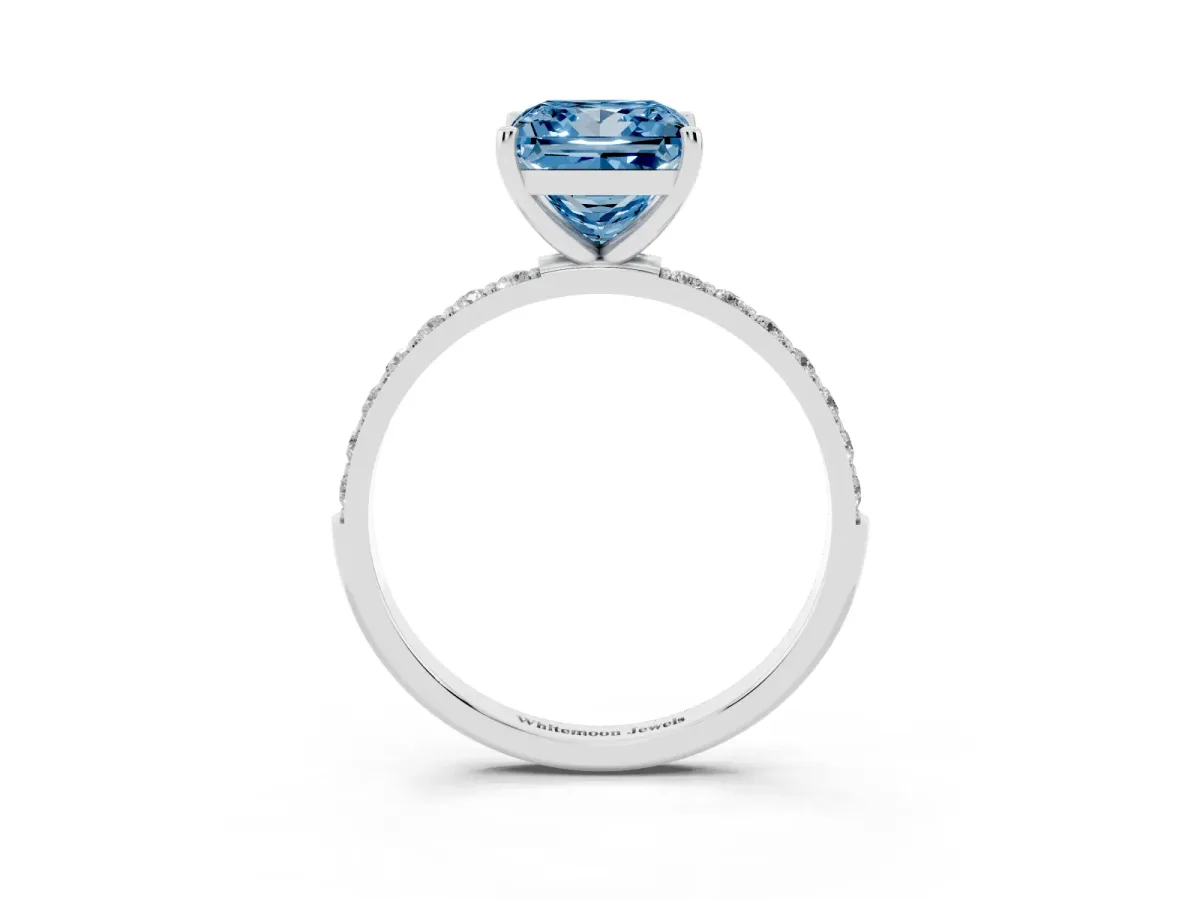 Fancy Blue Princess Cut Diamond Solitaire Ring with Round Pavé Shoulders and Prong Setting Silver