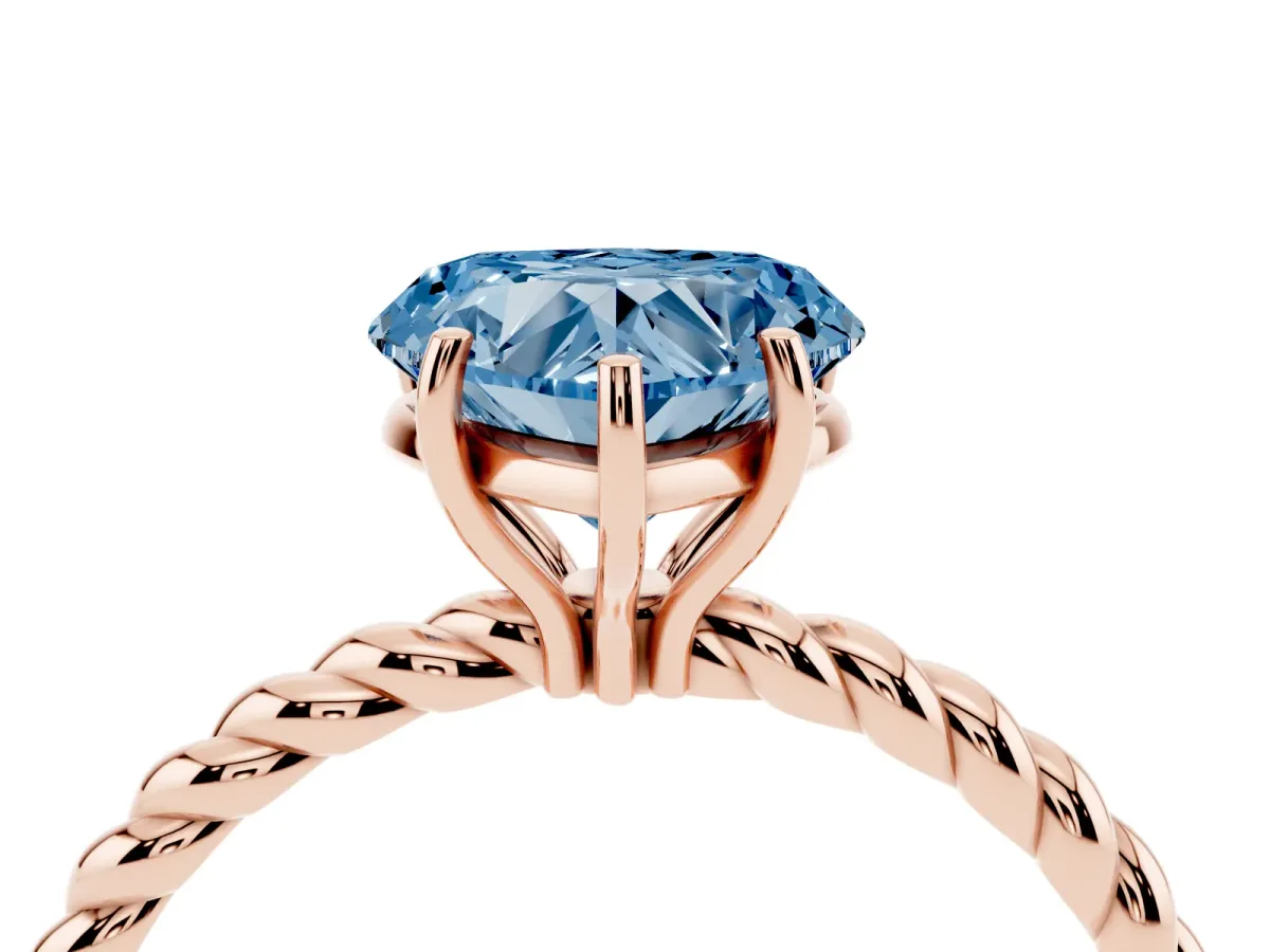 Fancy Blue Heart Cut Solitaire Twist Band Ring with Four-Prong Setting Rose gold