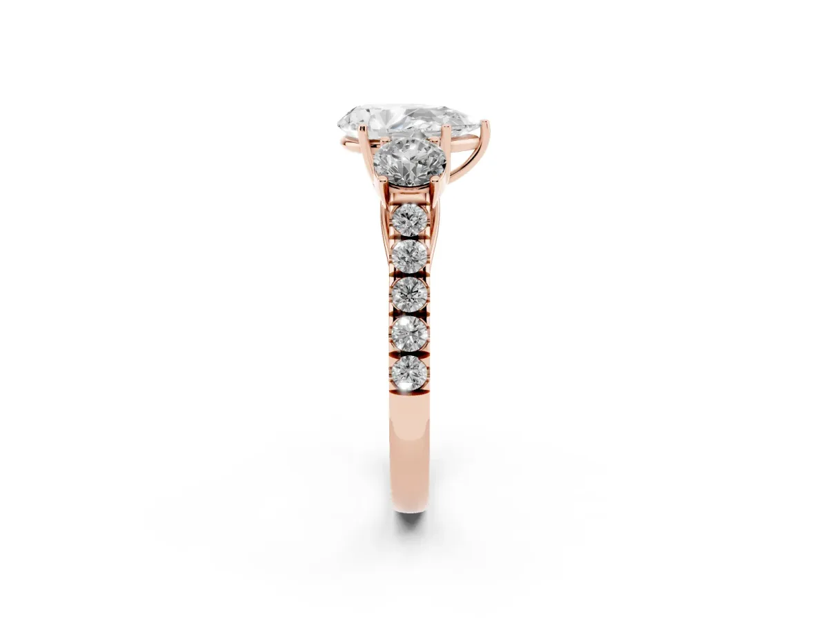 Pear Cut Cut Diamond Three-Stone Ring with Round Side Stones and Pavé Band Rose gold