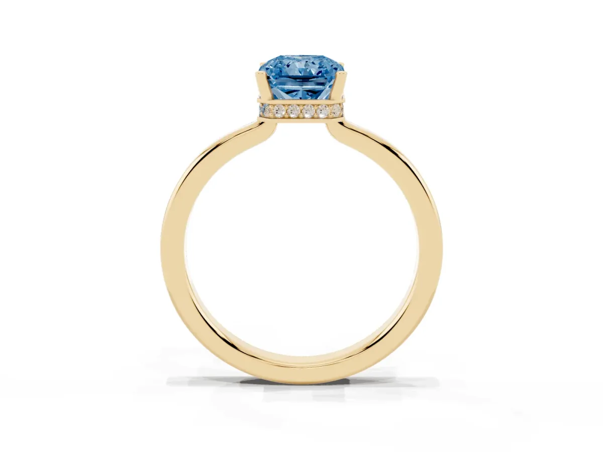 Fancy Blue Radiant Cut Cut Solitaire Engagement Ring with Four-Prong Setting on a Classic Band Yellow gold