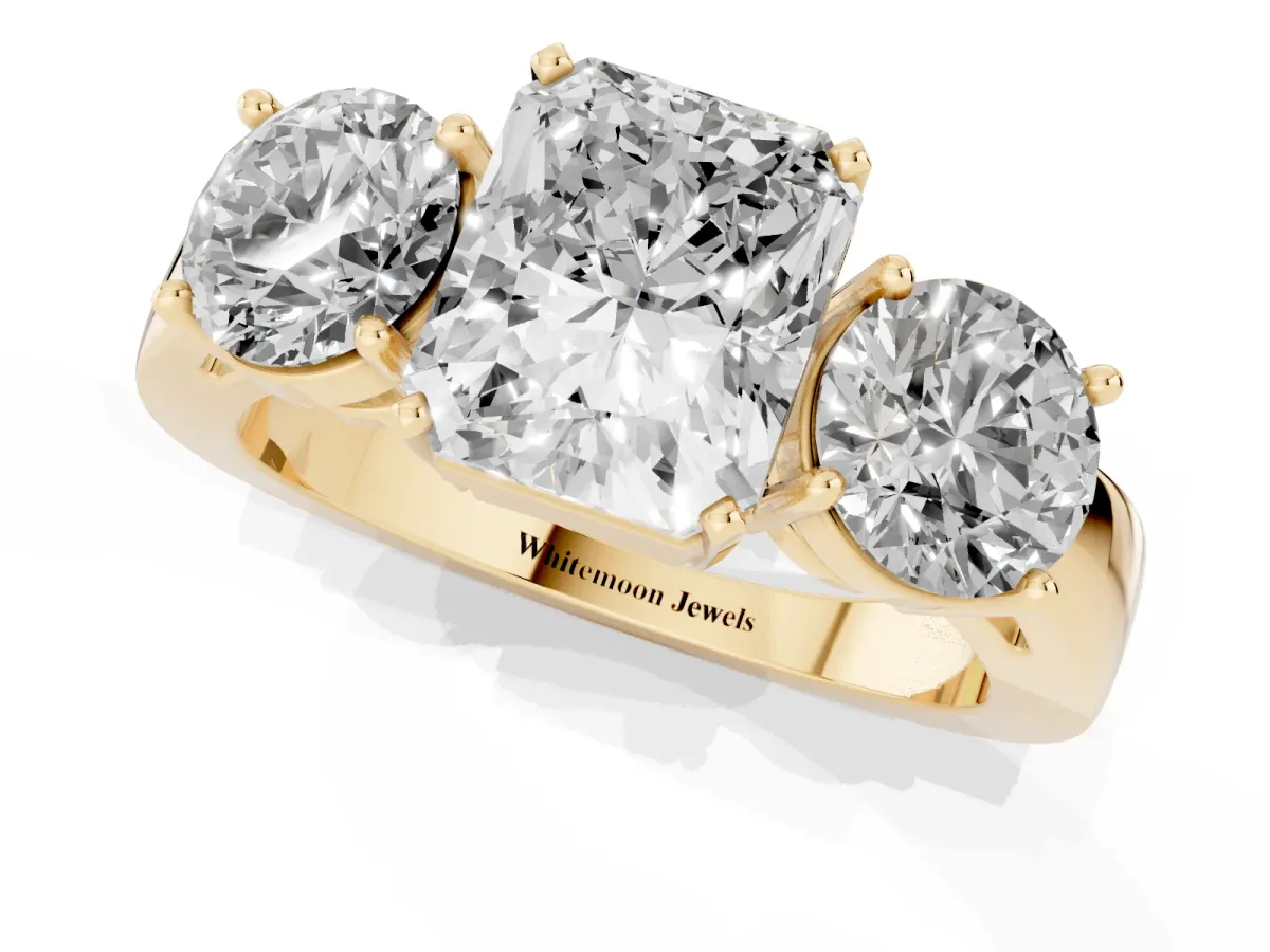 Three-Stone Radiant Cut Diamond Ring with Round Side Stones, Classic Band, and Four-Prong Setting Yellow gold