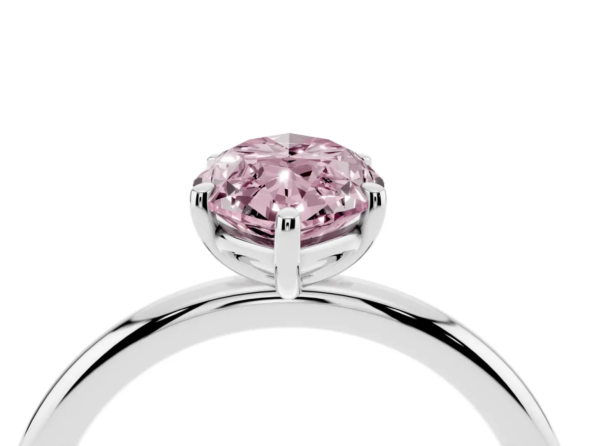 Fancy Pink Marquise Cut Solitaire Diamond Ring with Four-Prong Setting on a Plain Band Silver
