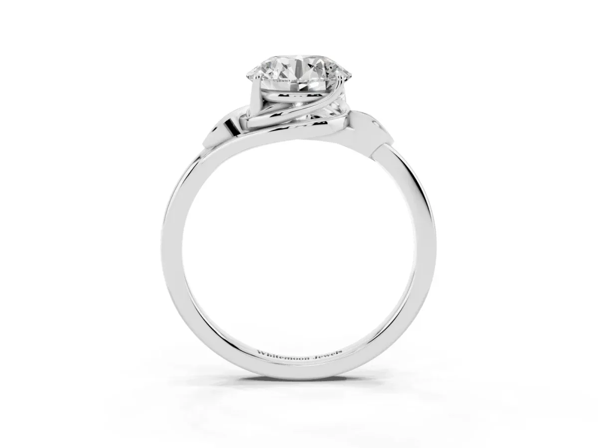 Round Cut Diamond Solitaire Ring with Twist Band and Four-Prong Setting Silver