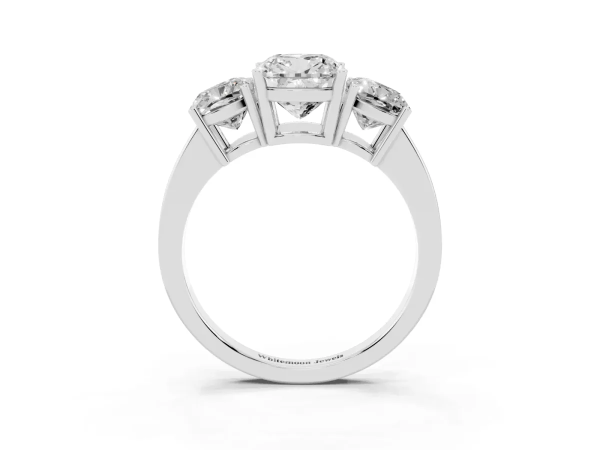 Three-Stone Cushion Cut Cut Diamond Engagement Ring with Flat Band and Four-Prong Setting Silver
