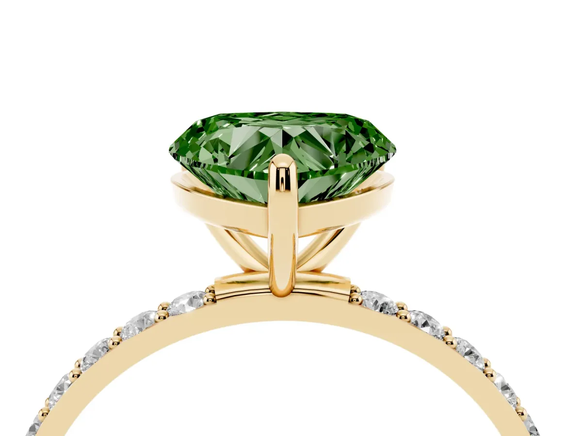 Fancy Green Heart Cut Diamond Solitaire Ring with Round Pavé Band and Prong Setting Yellow gold