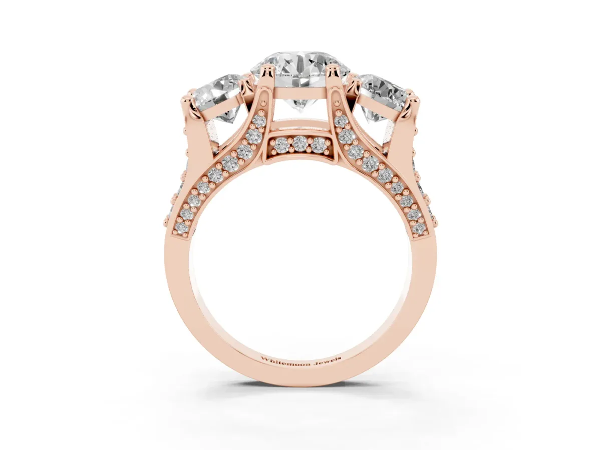 Round Cut Diamond Three-Stone Ring with Channel Set Band and Four-Prong Setting Rose gold