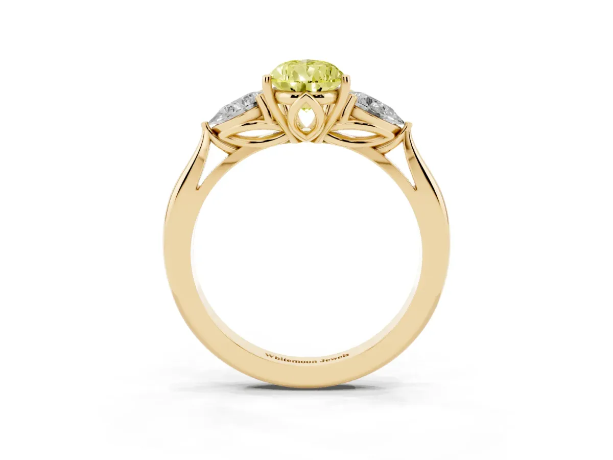 Fancy Yellow Pear Cut Diamond Three-Stone Ring with Pear Side Stones and Prong Setting Yellow gold