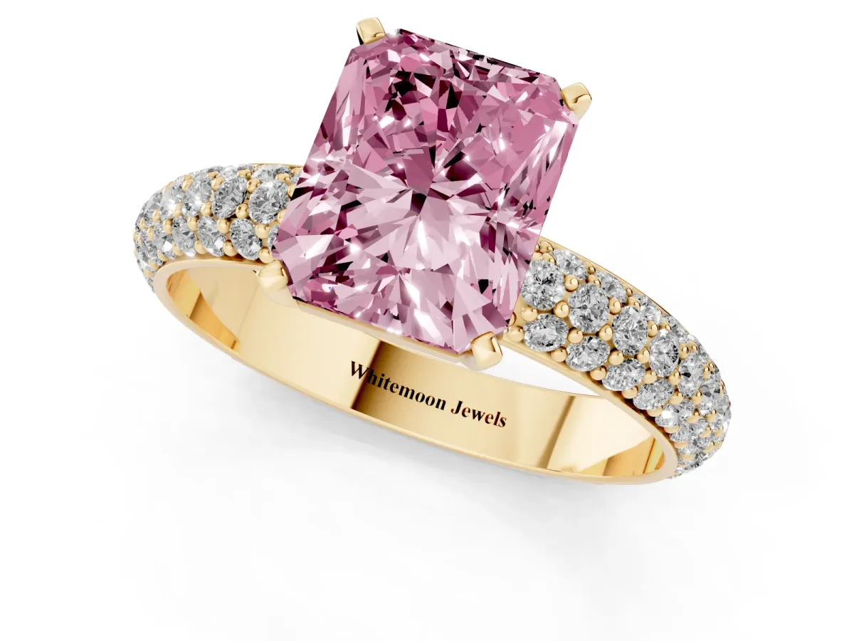 Fancy Pink Radiant Cut Diamond Solitaire Ring with Prong Setting and Pavé Band Yellow gold