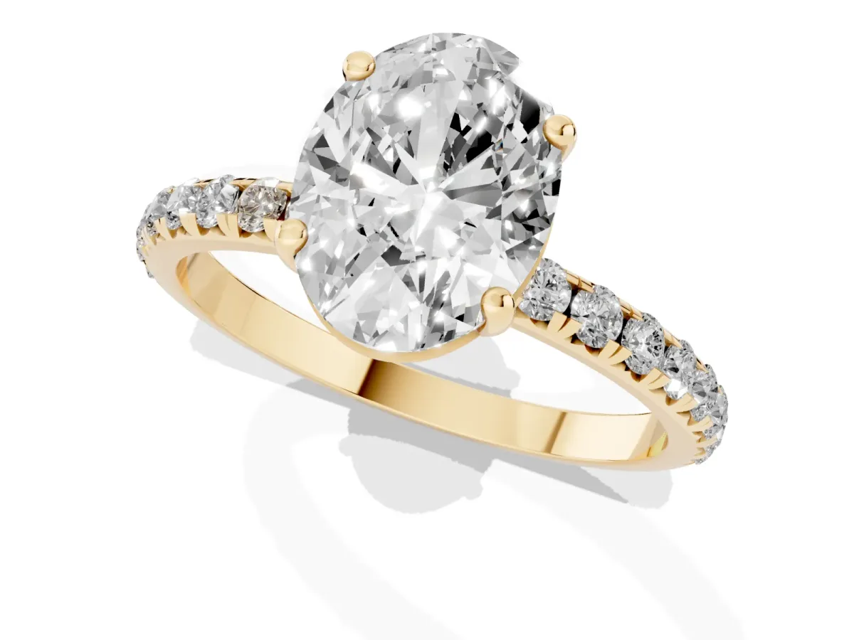 Oval Cut Cut Diamond Solitaire Ring with Micro Pave Band and Four Prong Setting Yellow gold