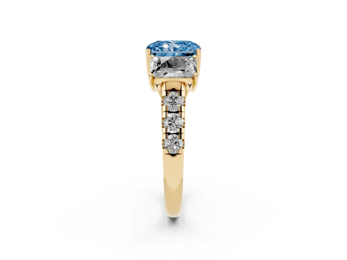 Fancy Blue Three-Stone Radiant Cut Diamond Pavé Band with Prong Setting Yellow gold