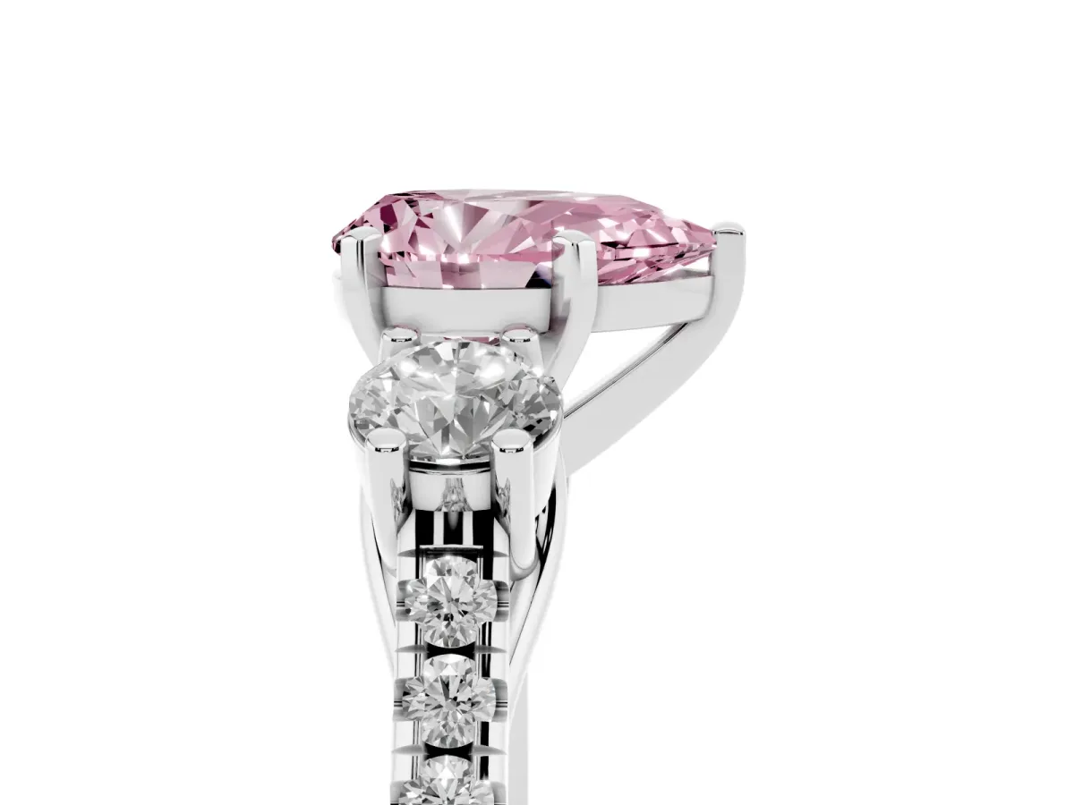 Fancy Pink Three-Stone Pear Cut Diamond Pavé Band with Four-Prong Setting Platinum