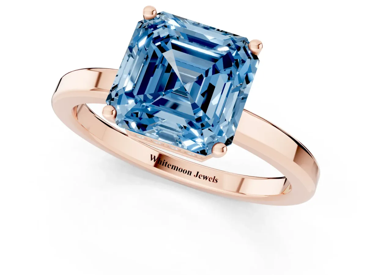 Fancy Blue Asscher Cut Cut Solitaire Engagement Ring with Four-Prong Setting on a Classic Band Rose gold