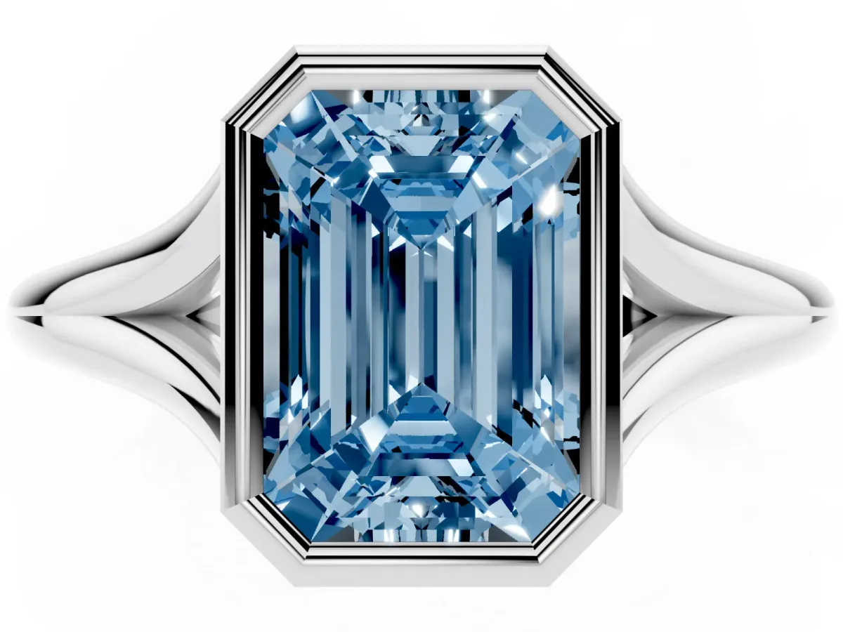 Fancy Blue Bezel Set Emerald Cut Cut Solitaire Ring with Tapered Band Silver