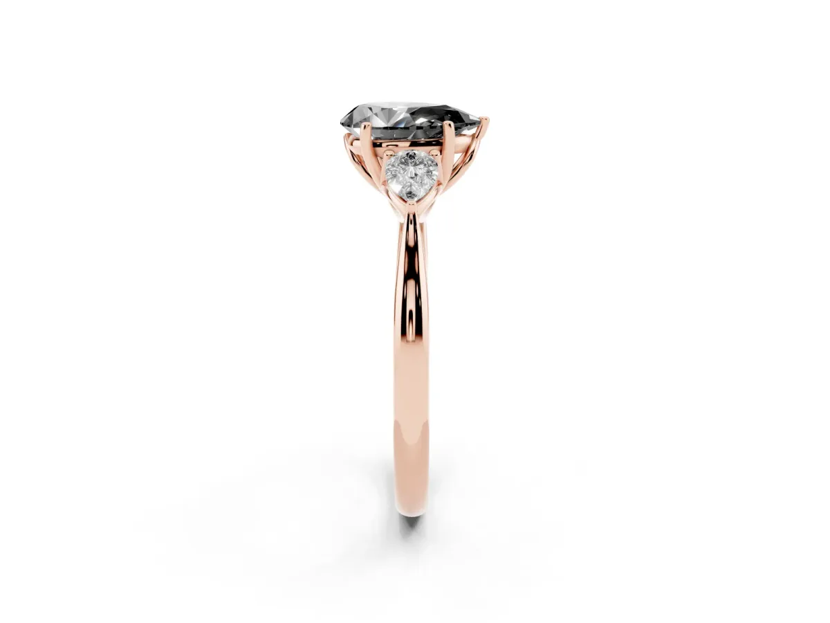 Fancy Black Three-Stone Pear Cut Brilliant Diamond Solitaire Ring with Tapered Band and Four-Prong Setting Rose gold