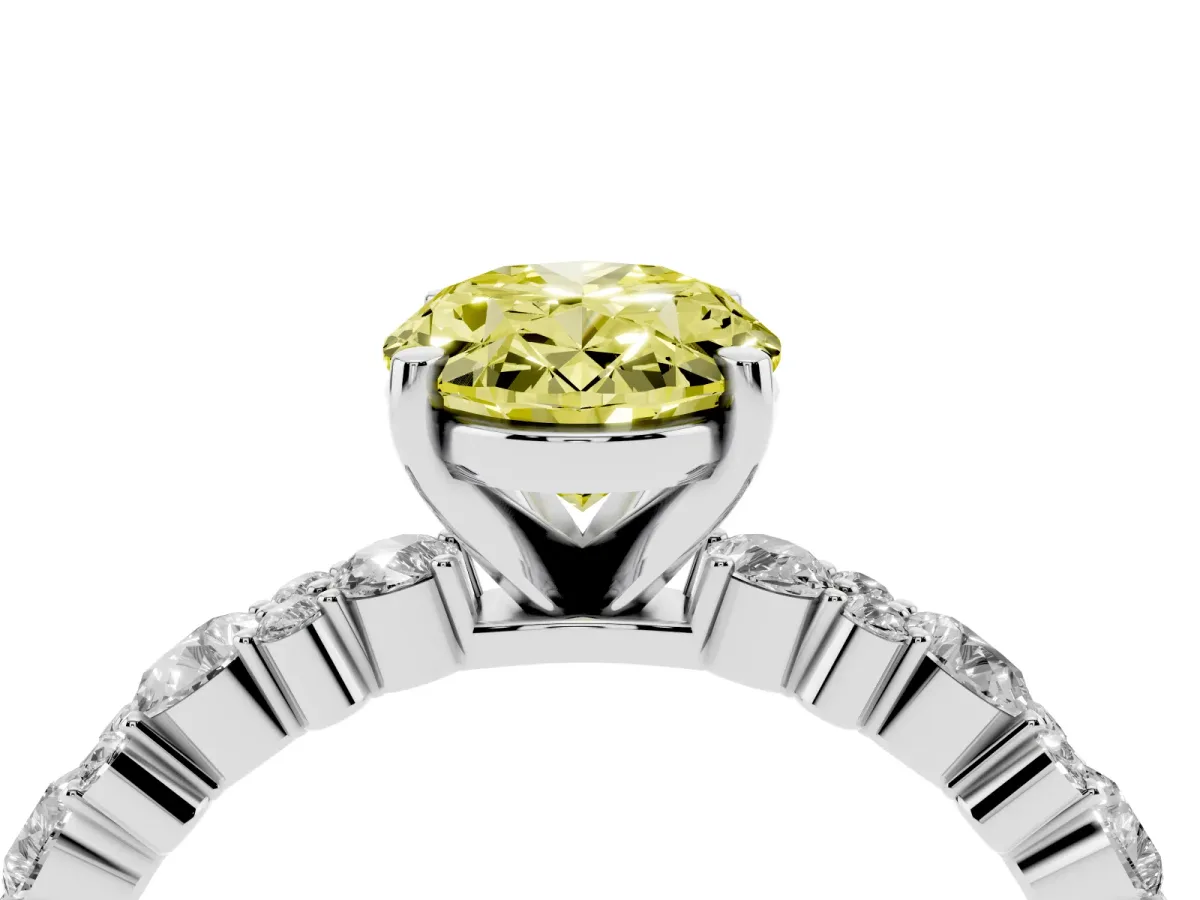 Fancy Yellow Oval Cut Diamond Side Stone Solitaire Ring with Round and Four-Prong Setting Platinum