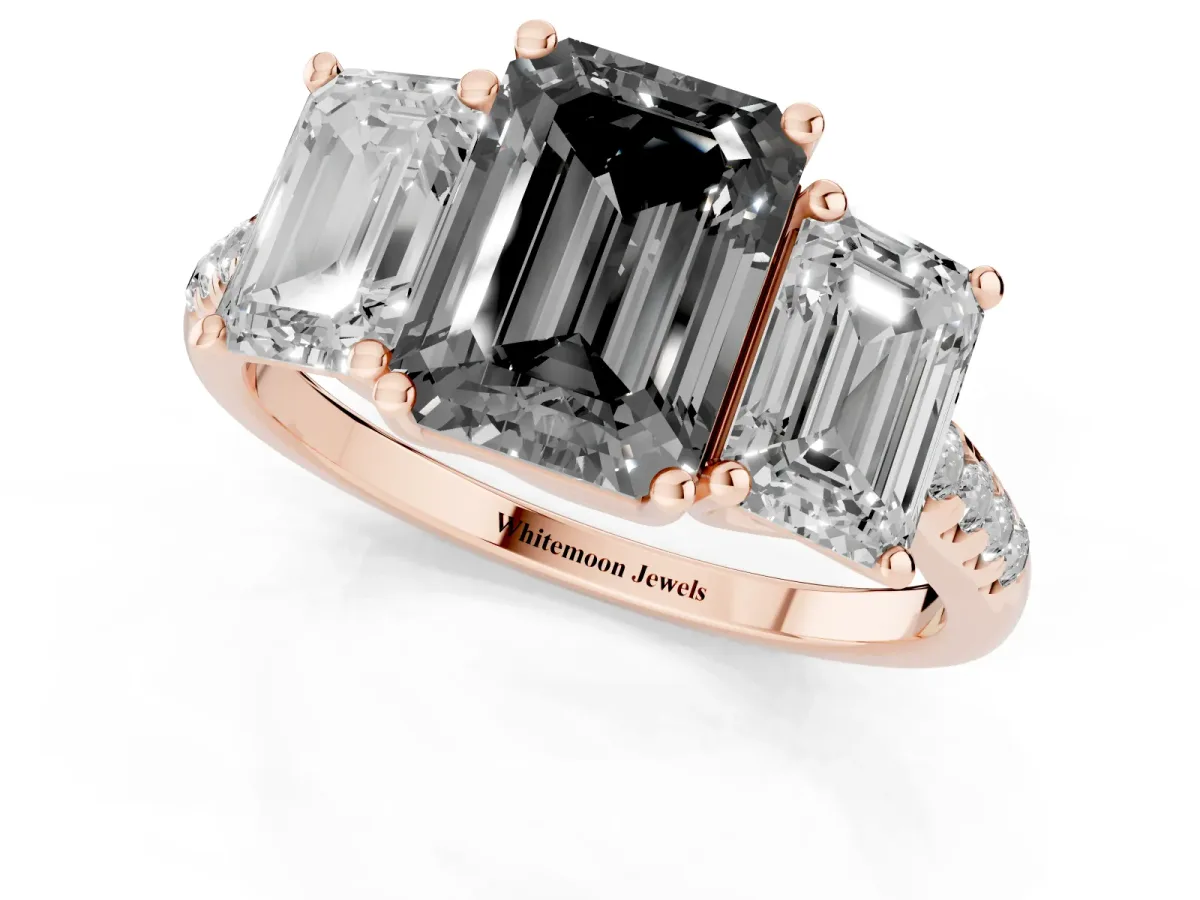 Fancy Black Three-Stone Emerald Cut Diamond Ring with Round Pavé Band and Prong Setting Rose gold