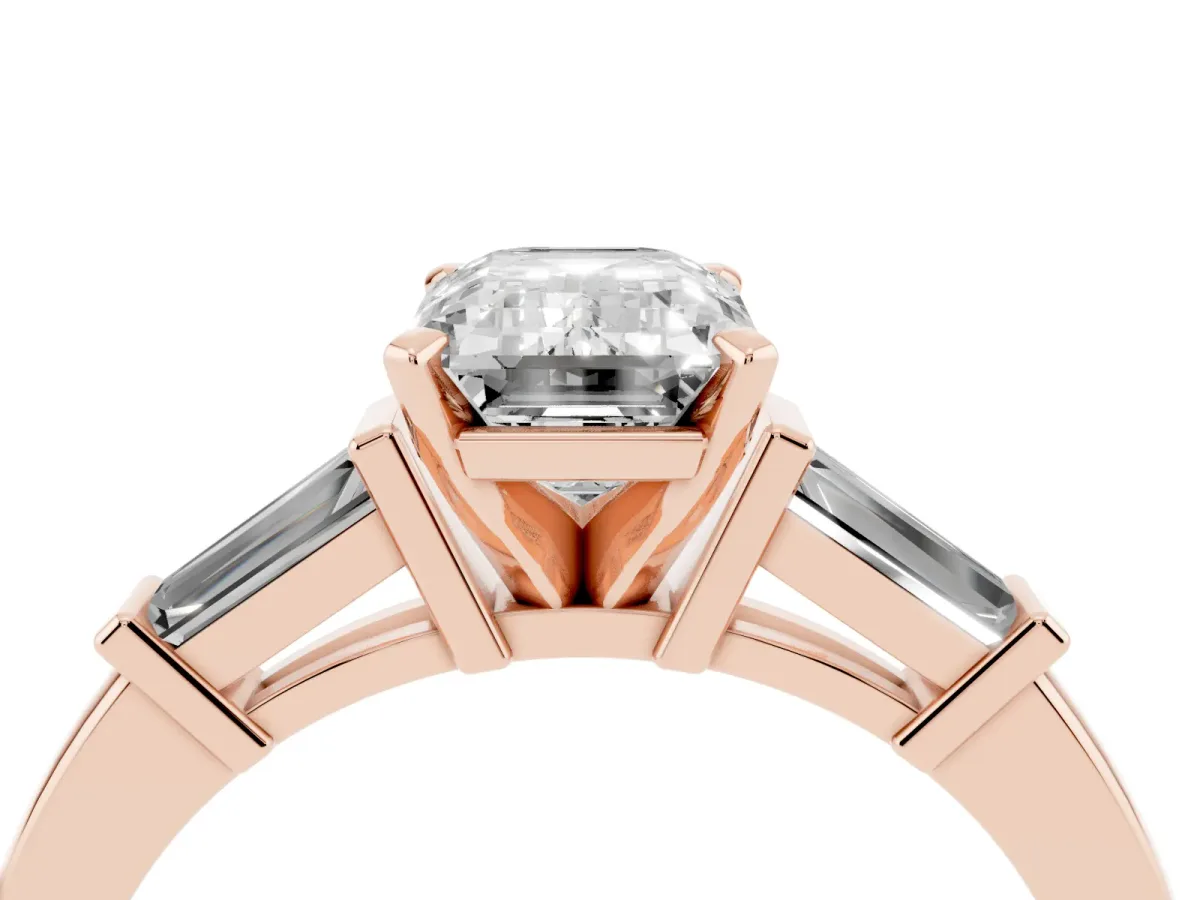 Emerald Cut Cut Diamond Solitaire Ring with Tapered Baguette Accents and Four-Prong Setting Rose gold