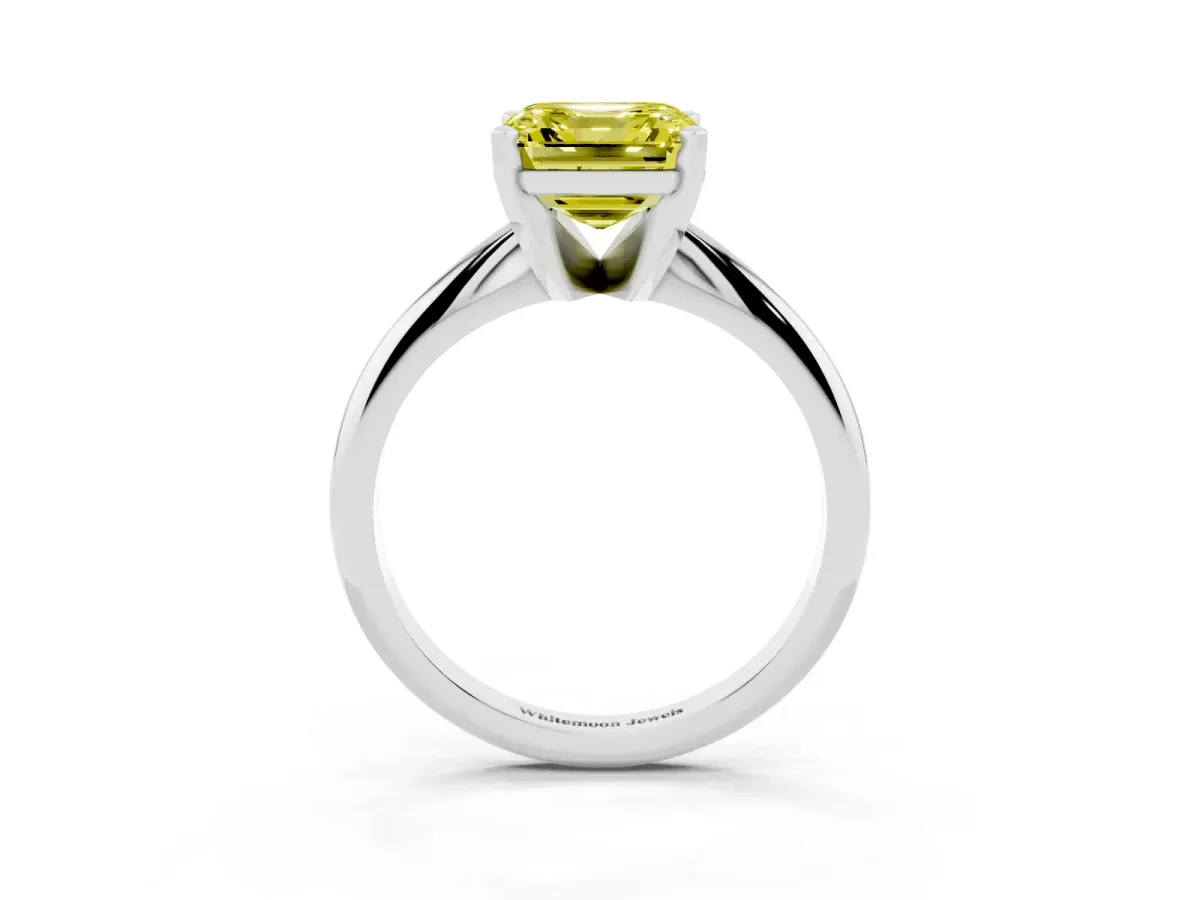 Fancy Yellow Asscher Cut Cut Solitaire Ring with Four-Prong Setting on a Classic Band Silver