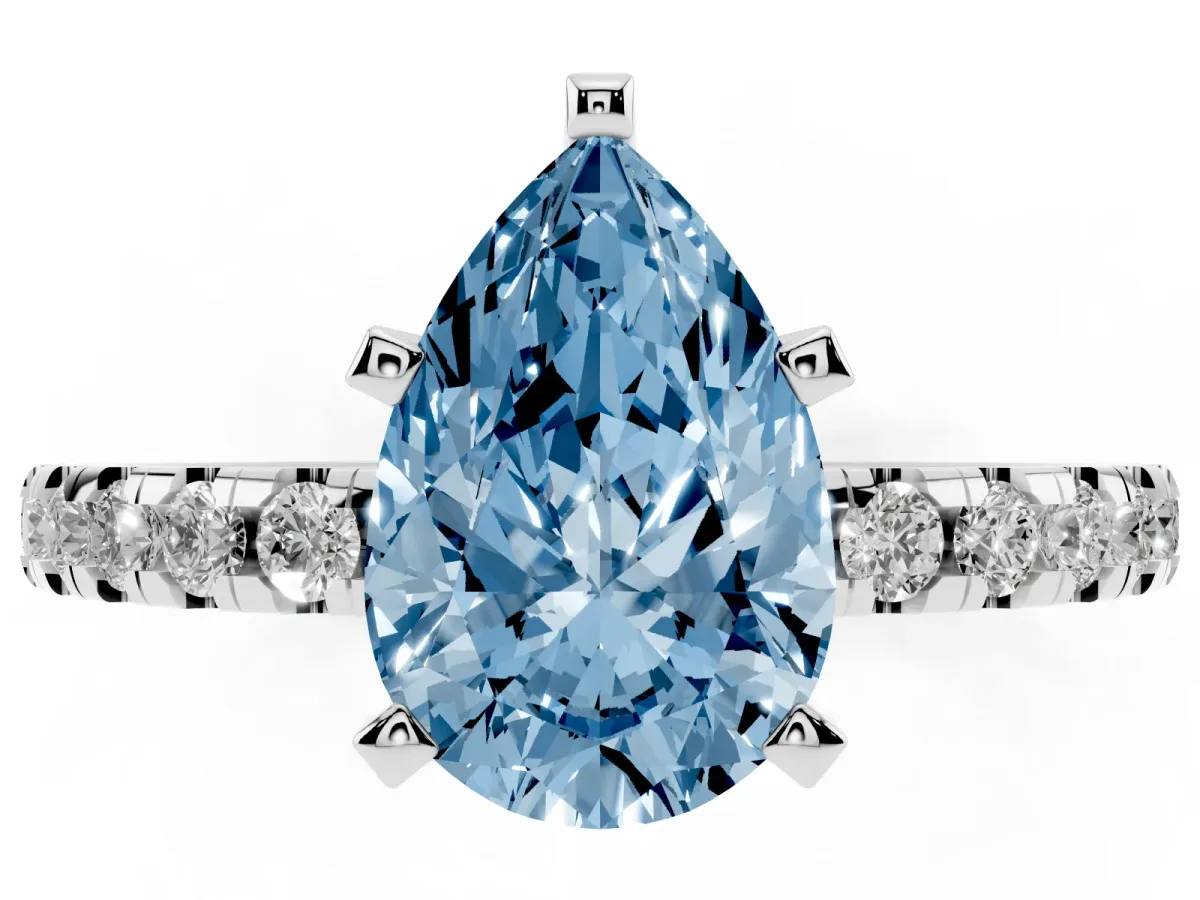 Fancy Blue Pear Cut Diamond Solitaire Ring with Round Pavé Band and Four-Prong Setting Silver
