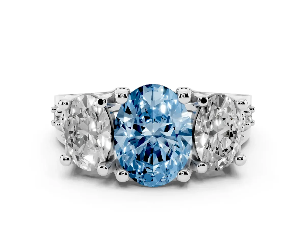 Fancy Blue Oval Cut Diamond Three-Stone Ring with Channel Set Band and Four-Prong Setting Silver