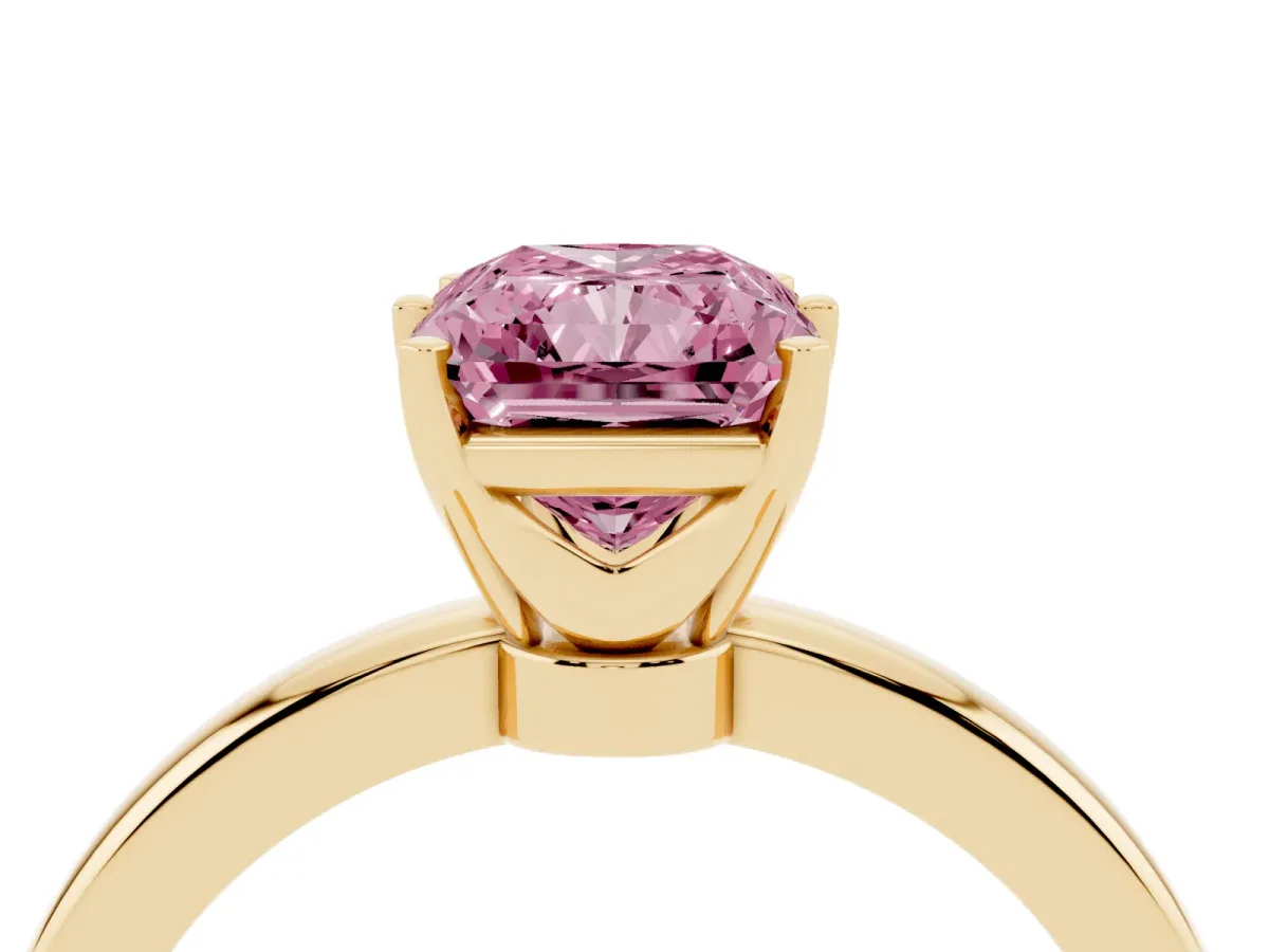 Fancy Pink Radiant Cut Solitaire Diamond Ring with Six-Prong Setting on a Classic Band Yellow gold