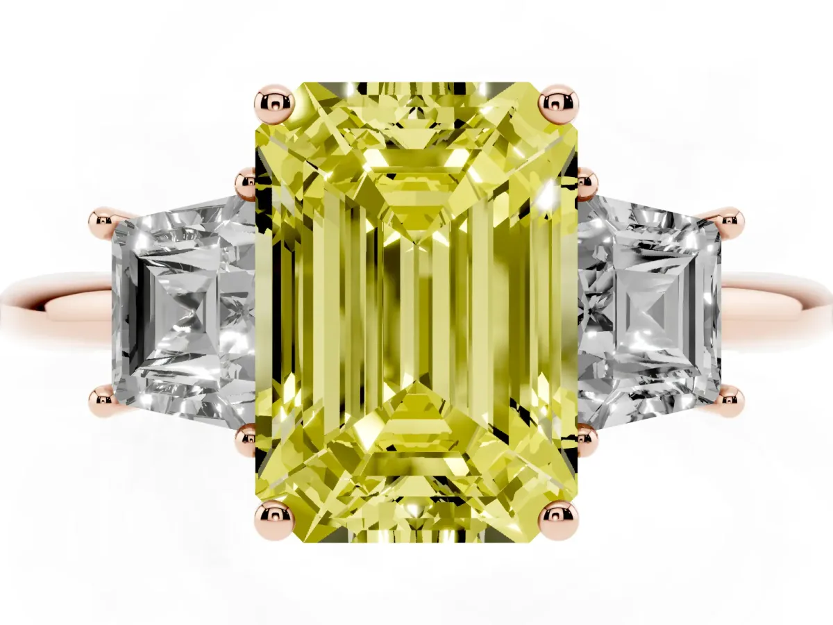 Fancy Yellow Emerald Cut Diamond Three-Stone Ring with Trapezoid Side Stones and Prong Setting Rose gold