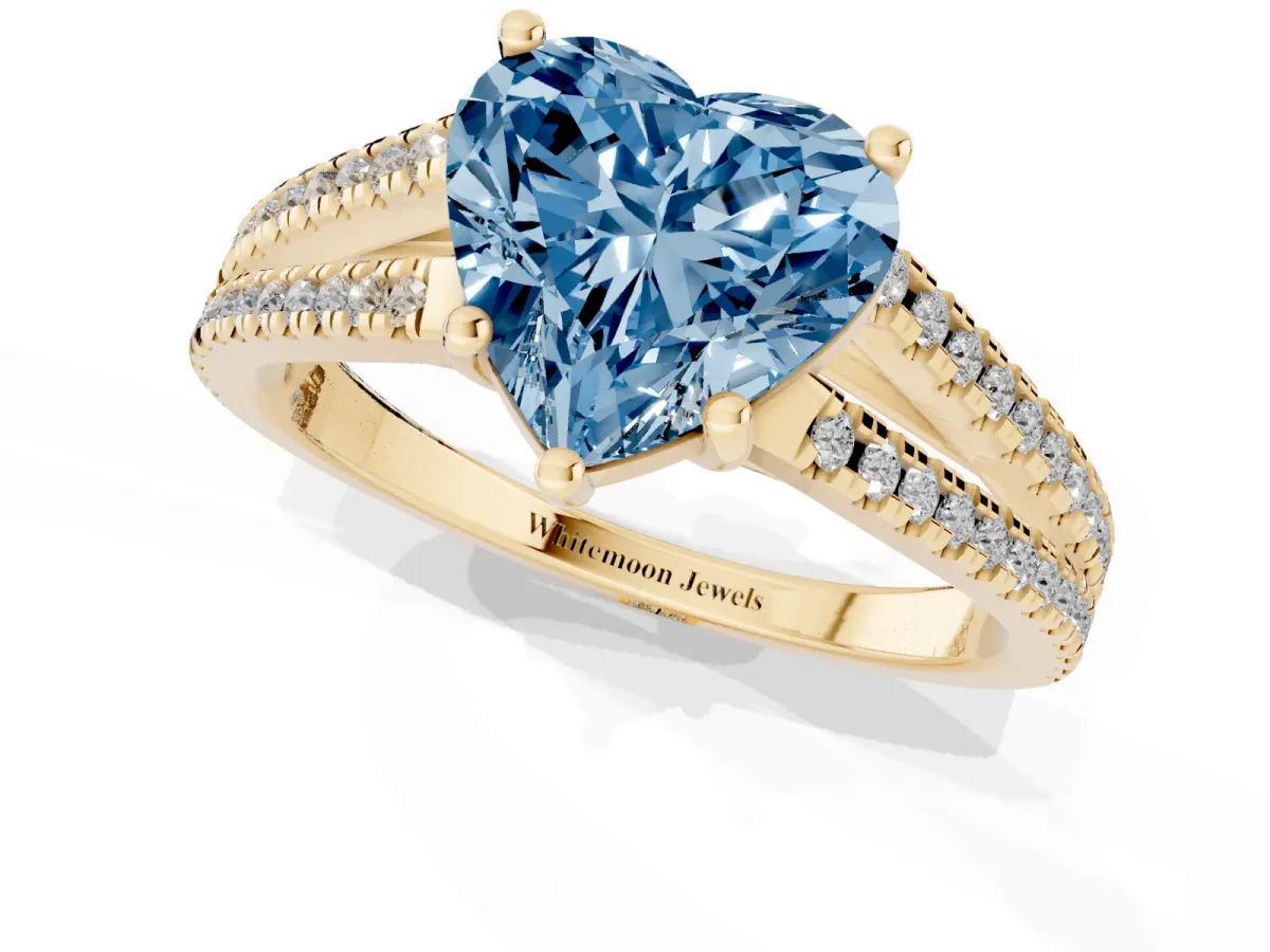 Fancy Blue Heart Cut Diamond Solitaire Engagement Ring with Split Shank Pavé Band Yellow gold