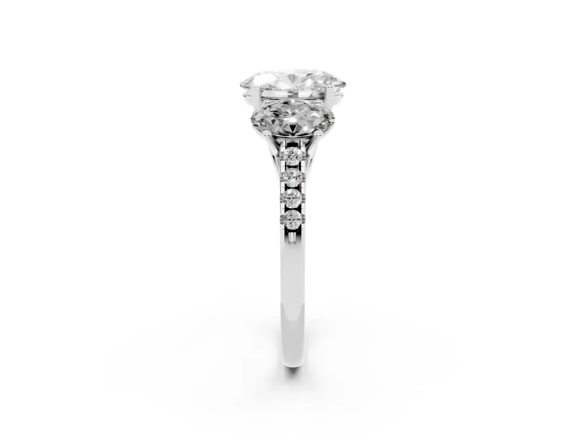 Three-Stone Oval Cut Diamond Ring with Round Pavé Band and Prong Setting Platinum