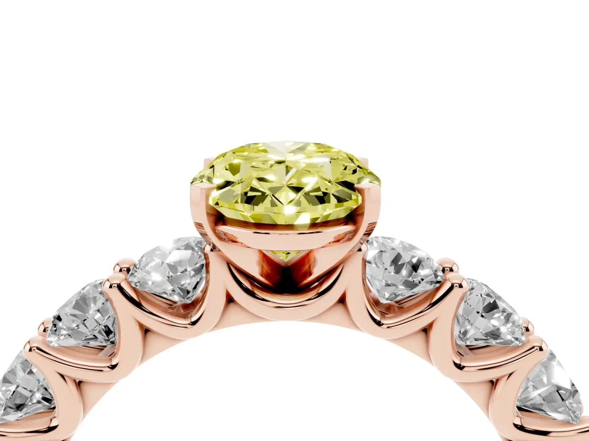 Fancy Yellow Oval Cut Diamond Prong Setting with Side Stones on a Pave Band Rose gold